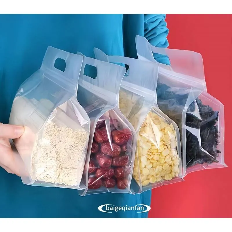 فیکٹری آؤٹ لیٹ ہینڈل شفاف پیکیجنگ پلاسٹک بیگ فلیٹ نیچے بیگ آٹھ سائیڈ مہر سنس پاؤچ